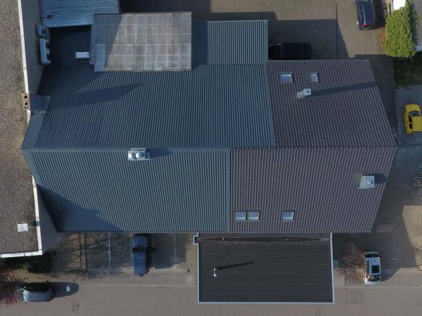 Brezel Böhmer Kuppenheim Dachsanierung mit Verkaufsraum/Café-Anbau 
